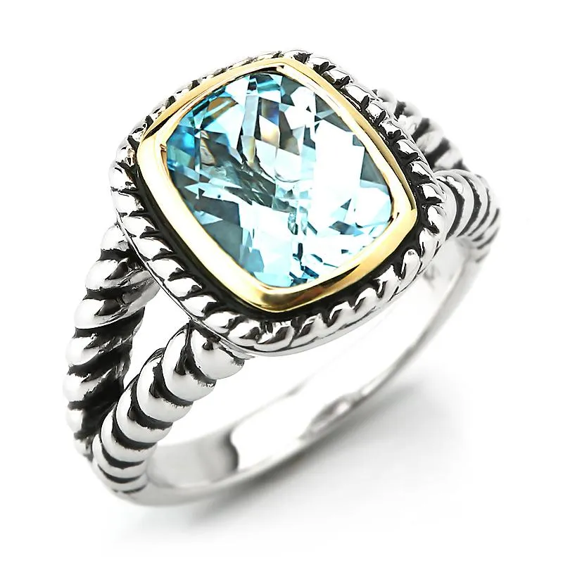 14K Gold And 925 Sterling Silver Ring in Blue Topaz (141R114803BT)