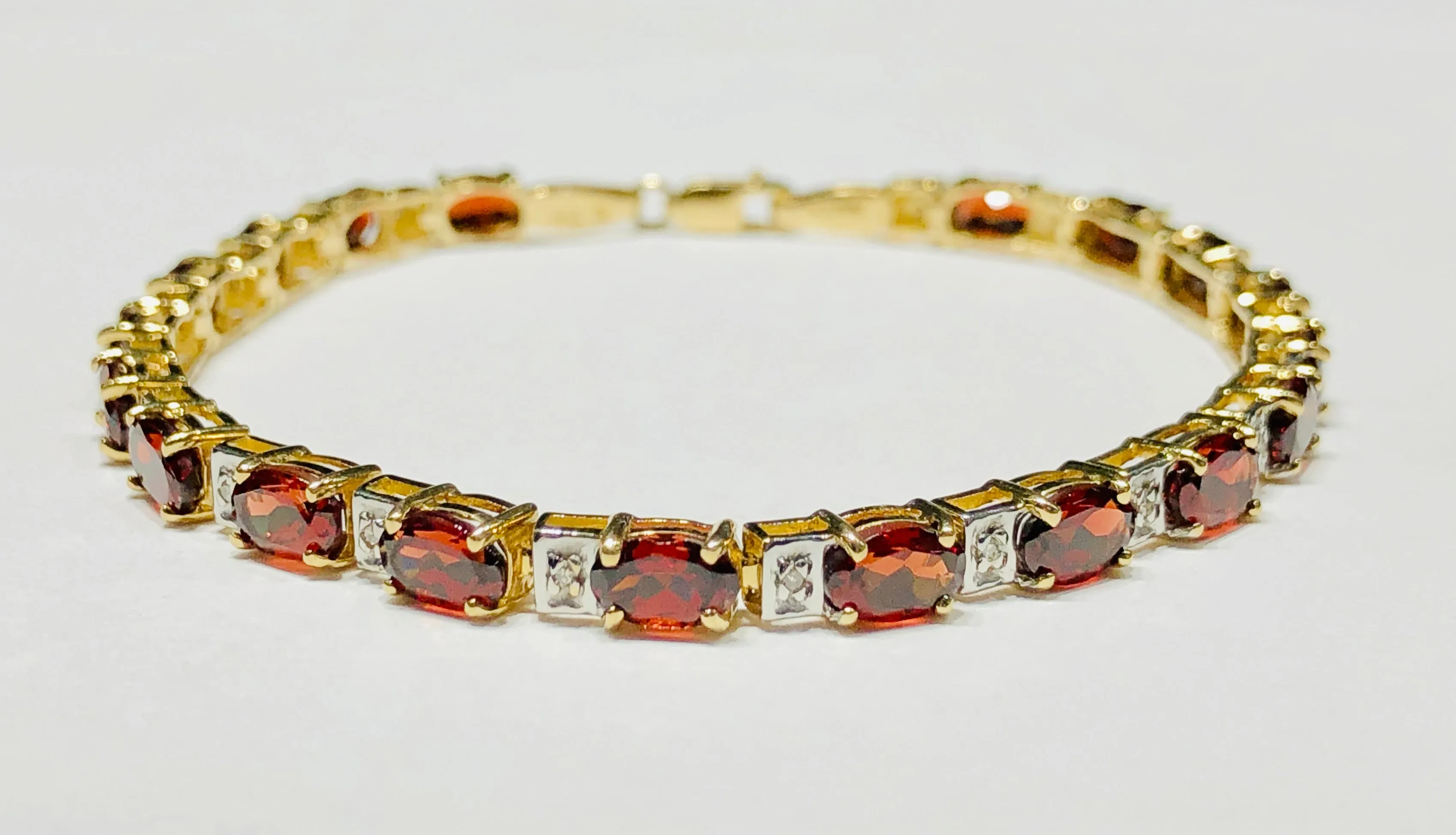 Oval Red Garnet Bracelet (10K)