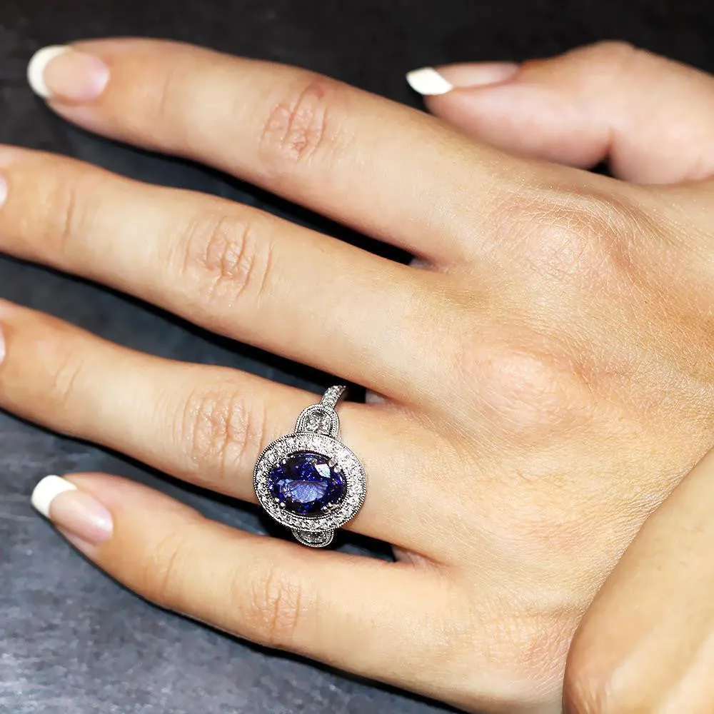 Oval Tanzanite Halo Ring with Half Moon Diamond’s 18K