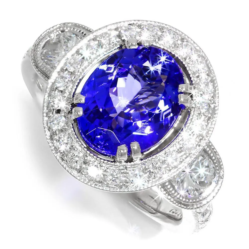 Oval Tanzanite Halo Ring with Half Moon Diamond’s 18K