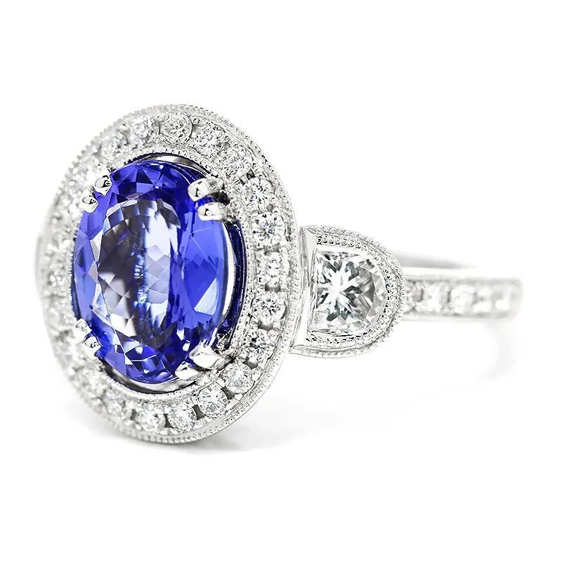 Oval Tanzanite Halo Ring with Half Moon Diamond’s 18K