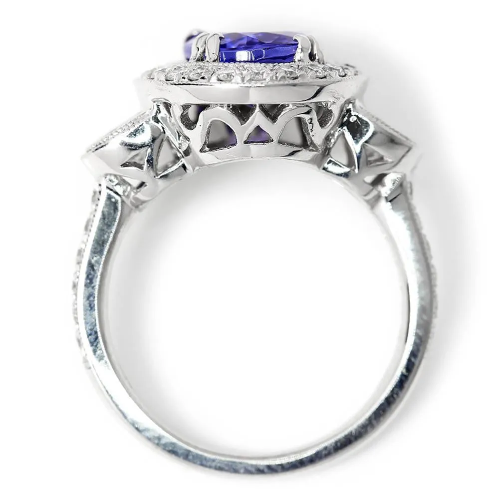 Oval Tanzanite Halo Ring with Half Moon Diamond’s 18K